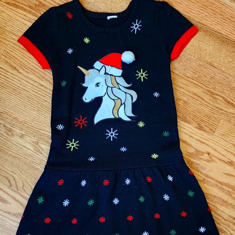 A nice Christmas dress black and red with a cute unicorn design